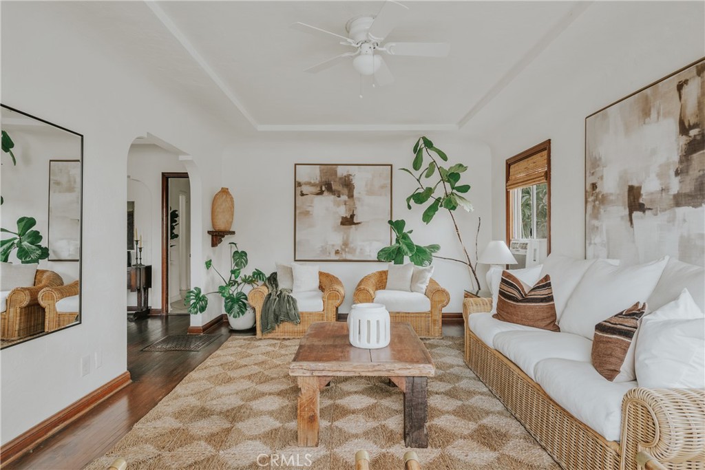 1502 East 57th Street Long Beach, CA 90805 - Photo 7 of 31 a living room with furniture and a window