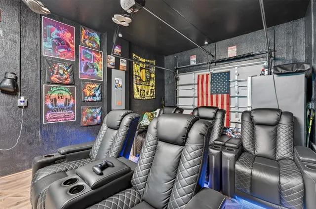 a view of a livingroom with furniture and a flat screen tv