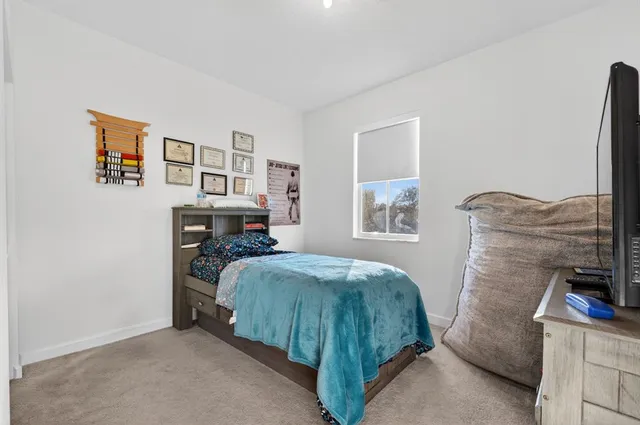 a view of a workspace with furniture