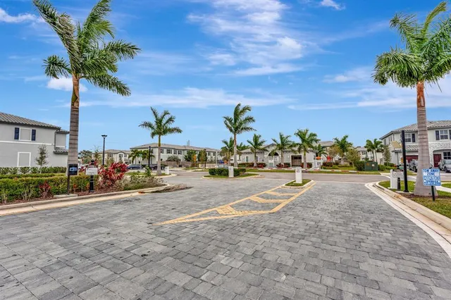 a swimming pool with outdoor seating and yard