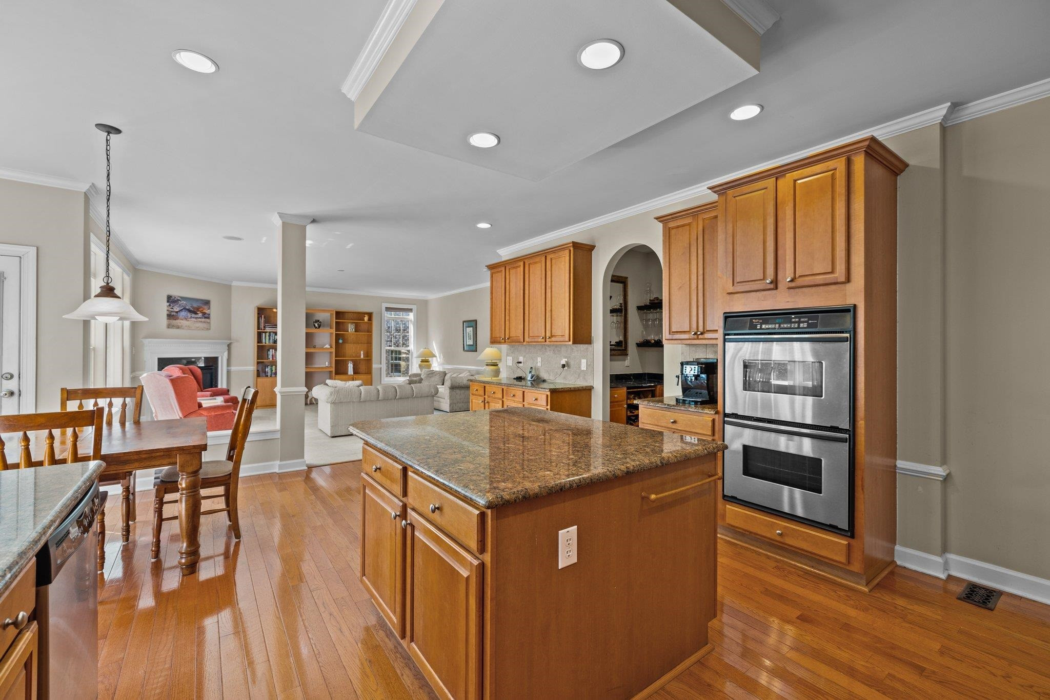 11900 Deneb Court Raleigh, NC 27614 - Photo 16 of 60 a kitchen with stainless steel appliances granite countertop a refrigerator a stove and a sink