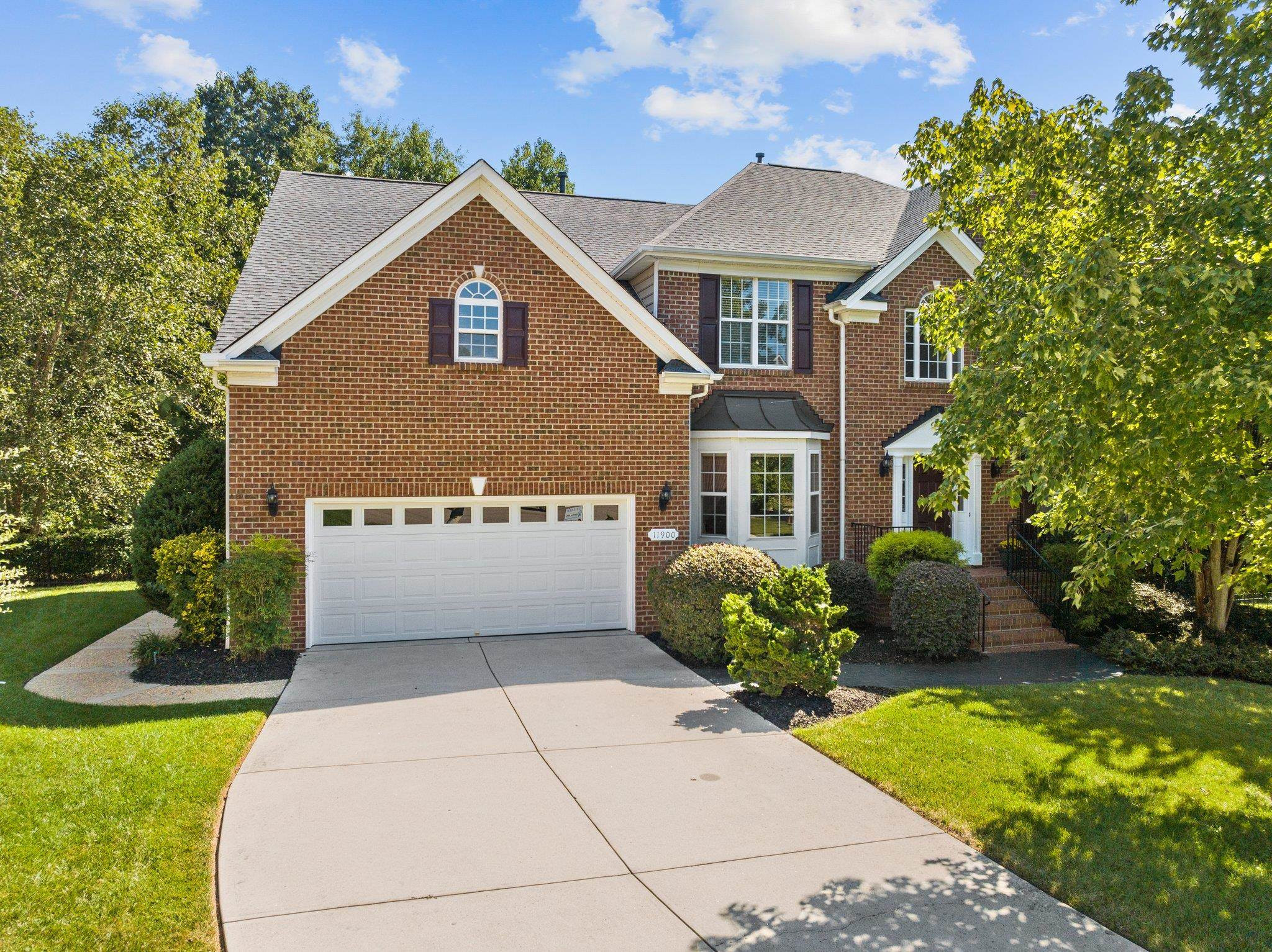 11900 Deneb Court Raleigh, NC 27614 - Photo 2 of 60 a front view of a house with a yard