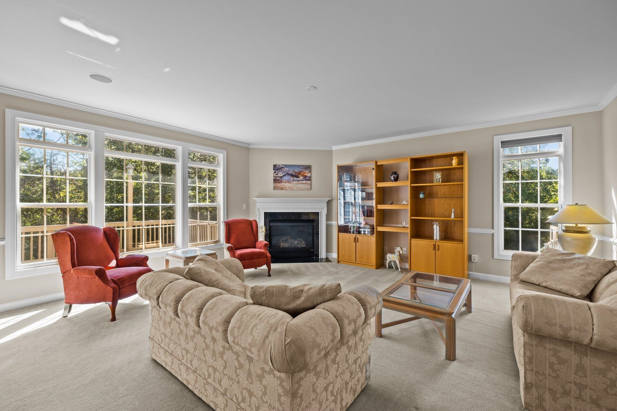 11900 Deneb Court Raleigh, NC 27614 - Photo 24 of 60 a living room with furniture and a fireplace