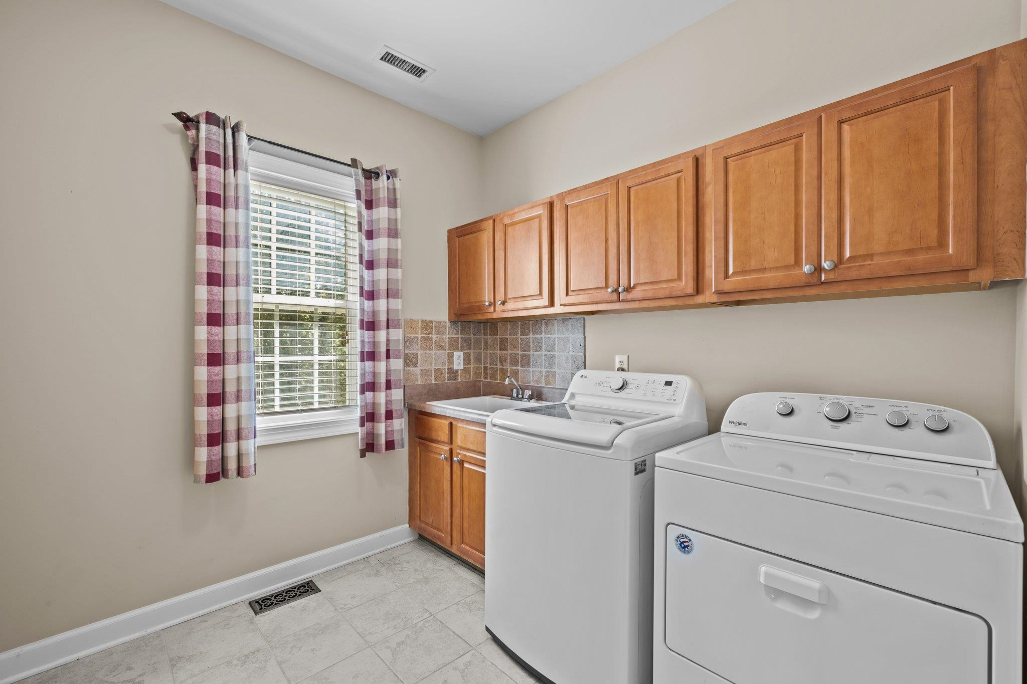 11900 Deneb Court Raleigh, NC 27614 - Photo 26 of 60 a utility room with dryer and washer