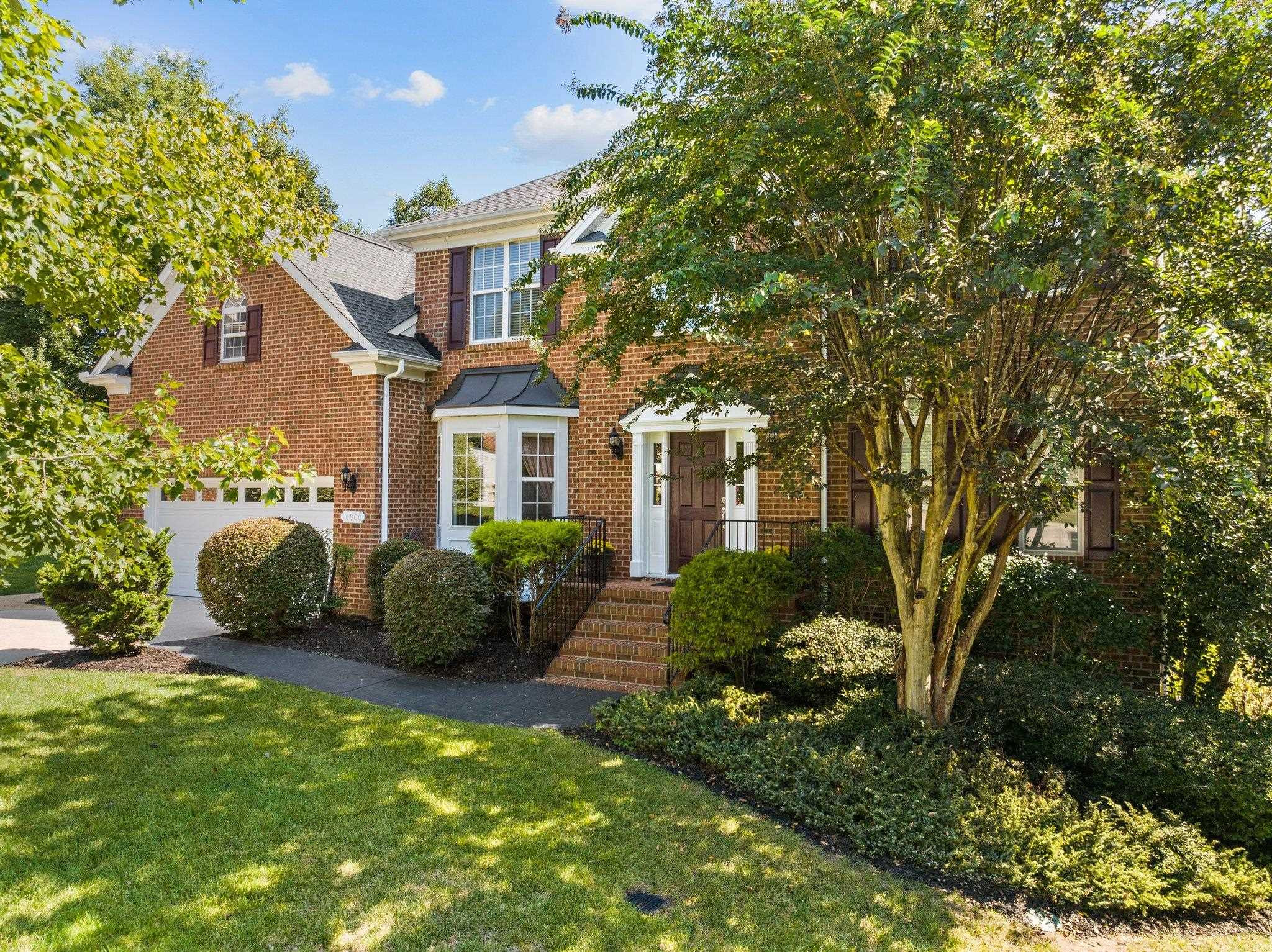 11900 Deneb Court Raleigh, NC 27614 - Photo 3 of 60 a front view of a house with garden