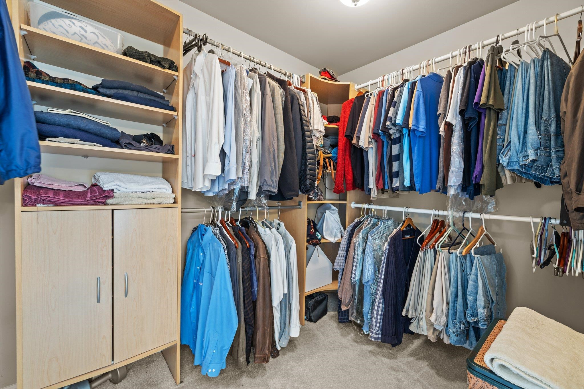 11900 Deneb Court Raleigh, NC 27614 - Photo 33 of 60 a view of walk in closet with clothes and shoes