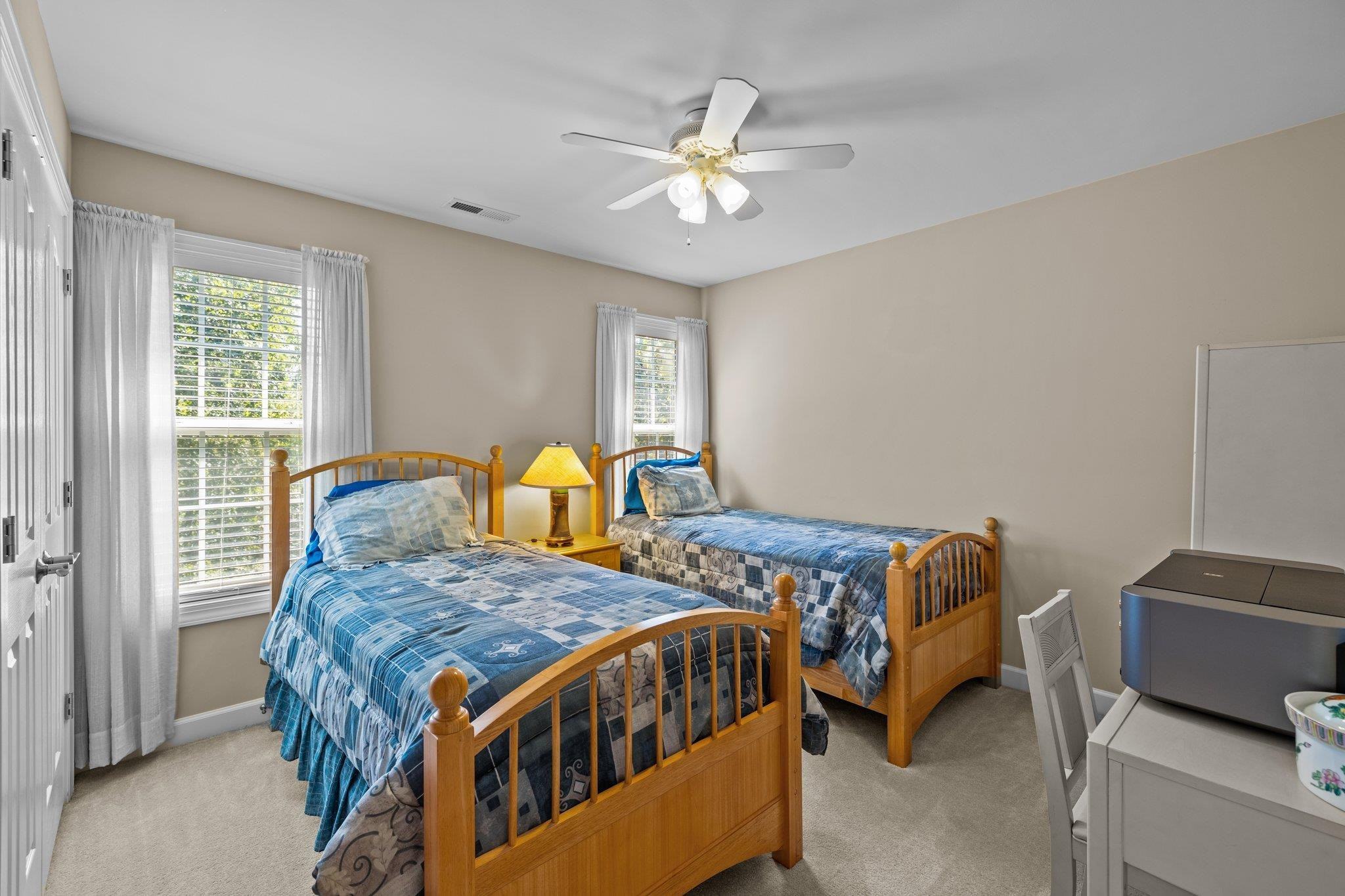 11900 Deneb Court Raleigh, NC 27614 - Photo 34 of 60 a bedroom with a bed and ceiling fan