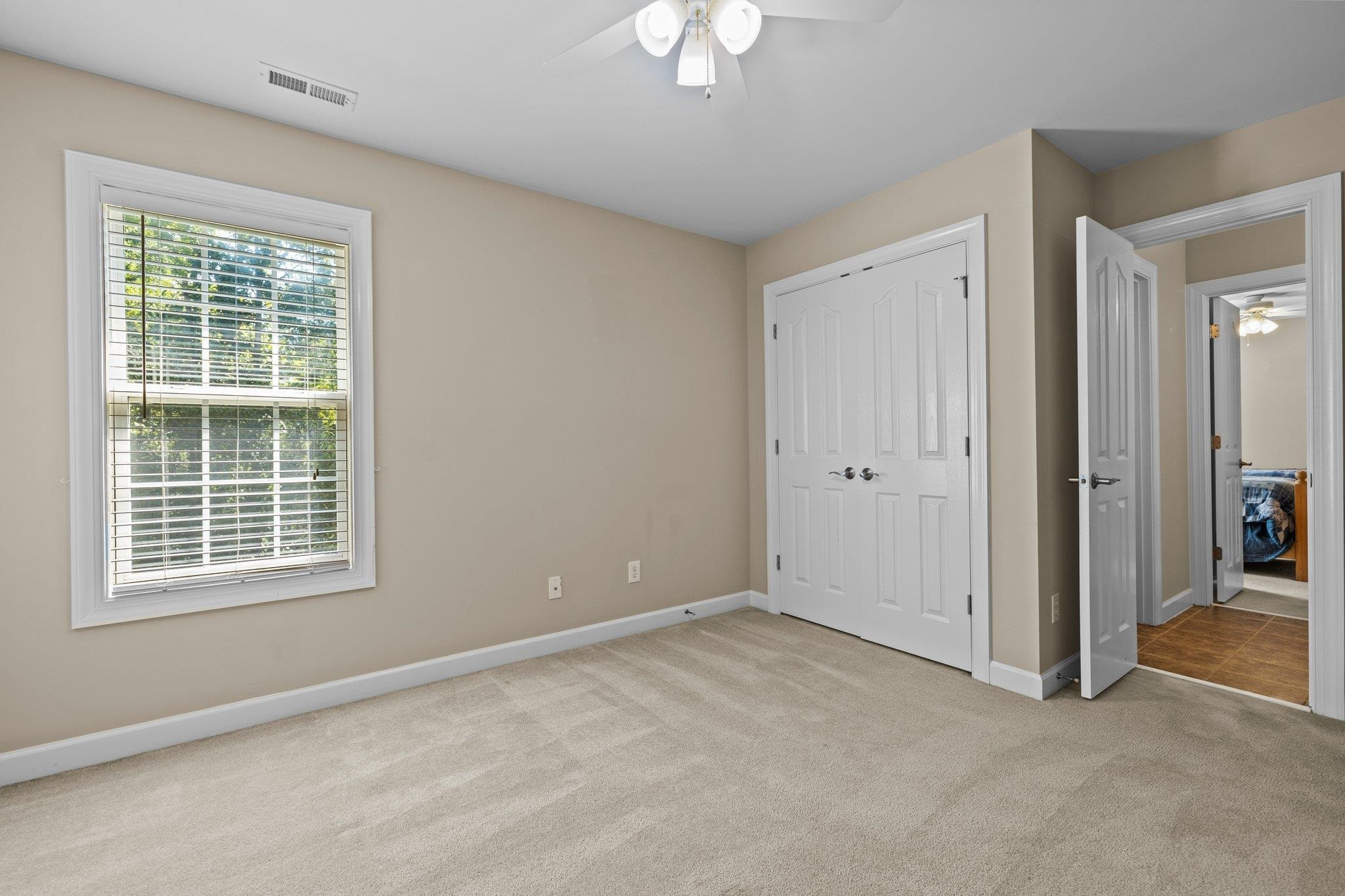 11900 Deneb Court Raleigh, NC 27614 - Photo 38 of 60 a view of an empty room with a window