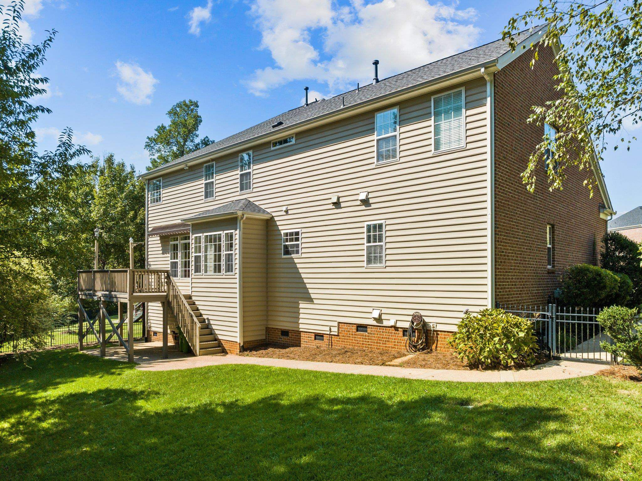 11900 Deneb Court Raleigh, NC 27614 - Photo 46 of 60 a front view of a house with a yard