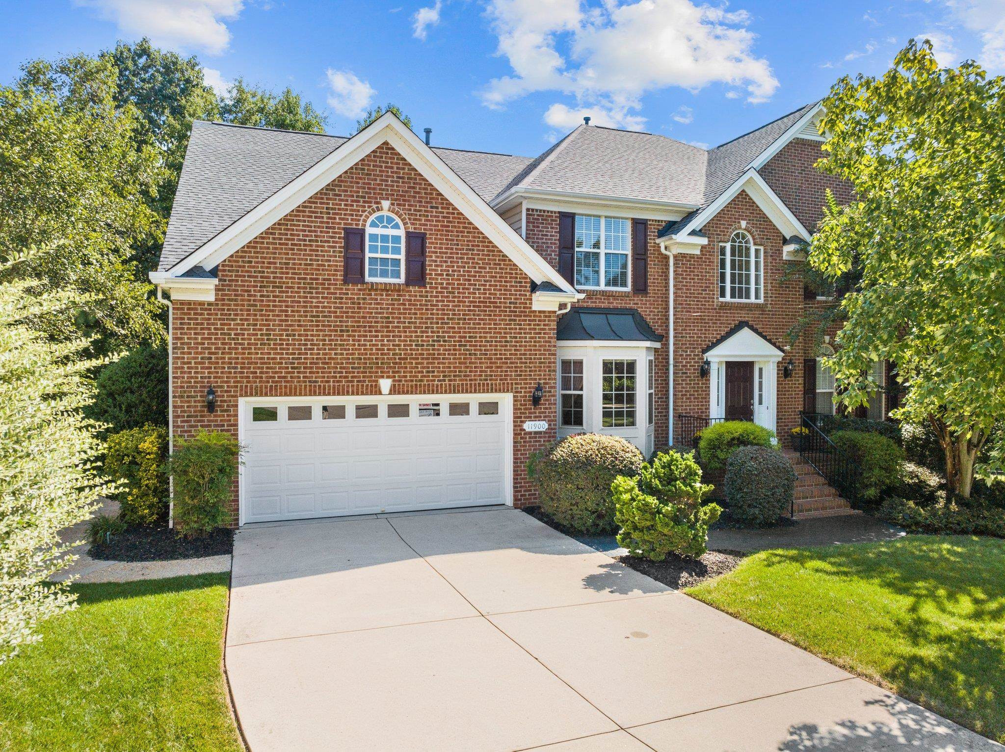 11900 Deneb Court Raleigh, NC 27614 - Photo 50 of 60 a front view of a house with a yard