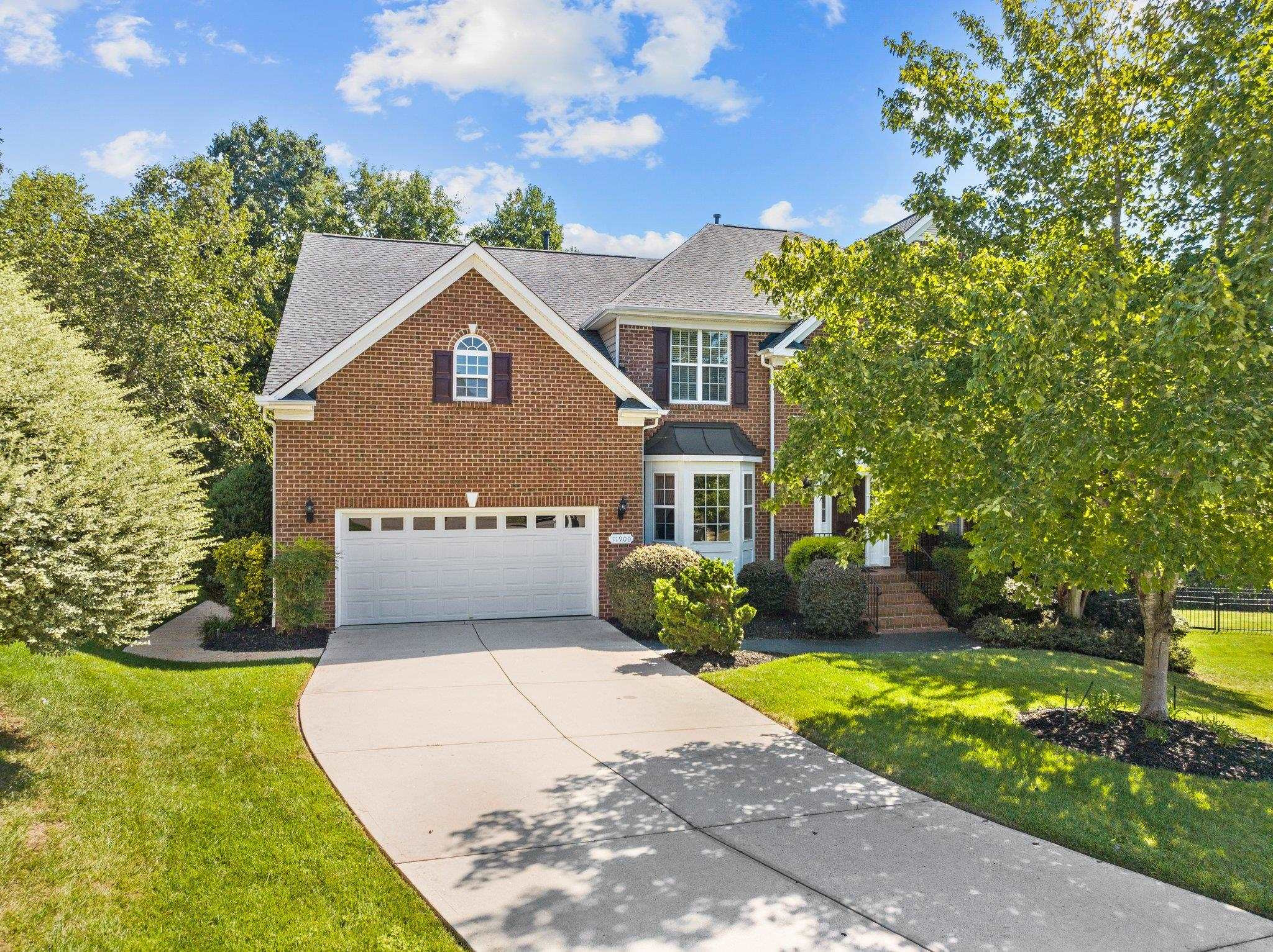 11900 Deneb Court Raleigh, NC 27614 - Photo 51 of 60 a front view of a house with a yard