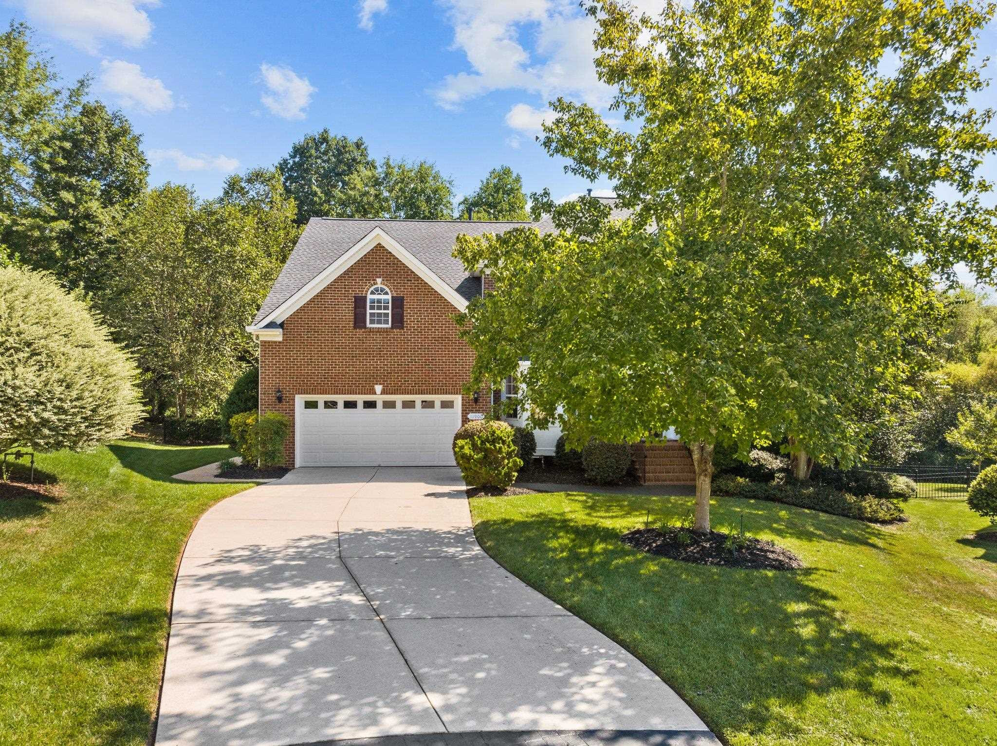 11900 Deneb Court Raleigh, NC 27614 - Photo 52 of 60 a front view of a house with a yard