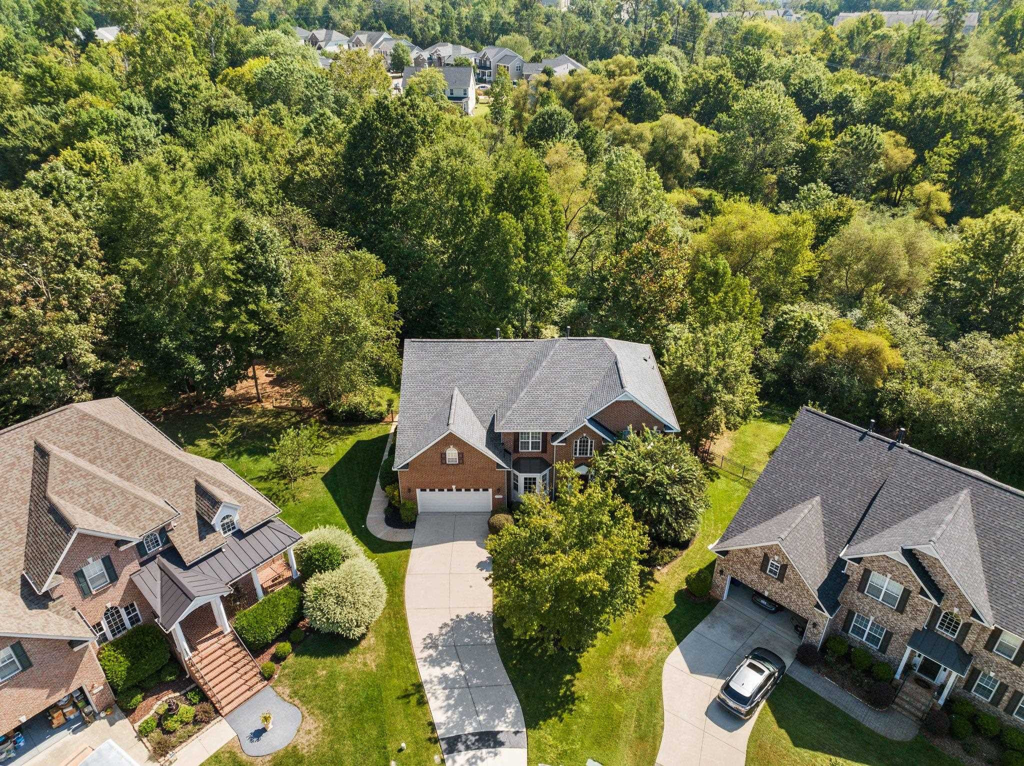 11900 Deneb Court Raleigh, NC 27614 - Photo 53 of 60 an aerial view of multiple houses with yard