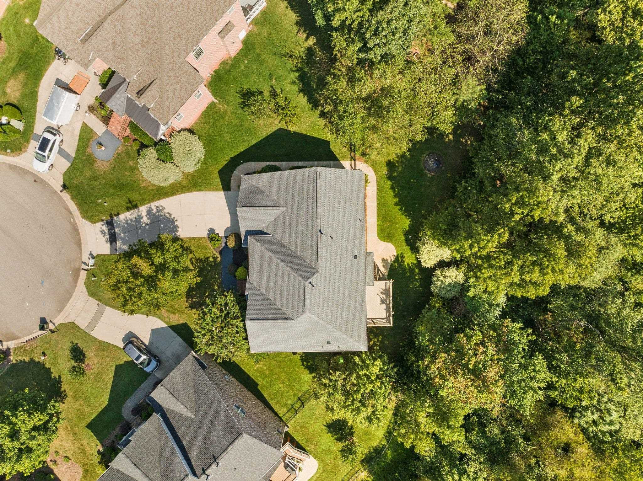 11900 Deneb Court Raleigh, NC 27614 - Photo 57 of 60 an aerial view of a house with a yard and trees