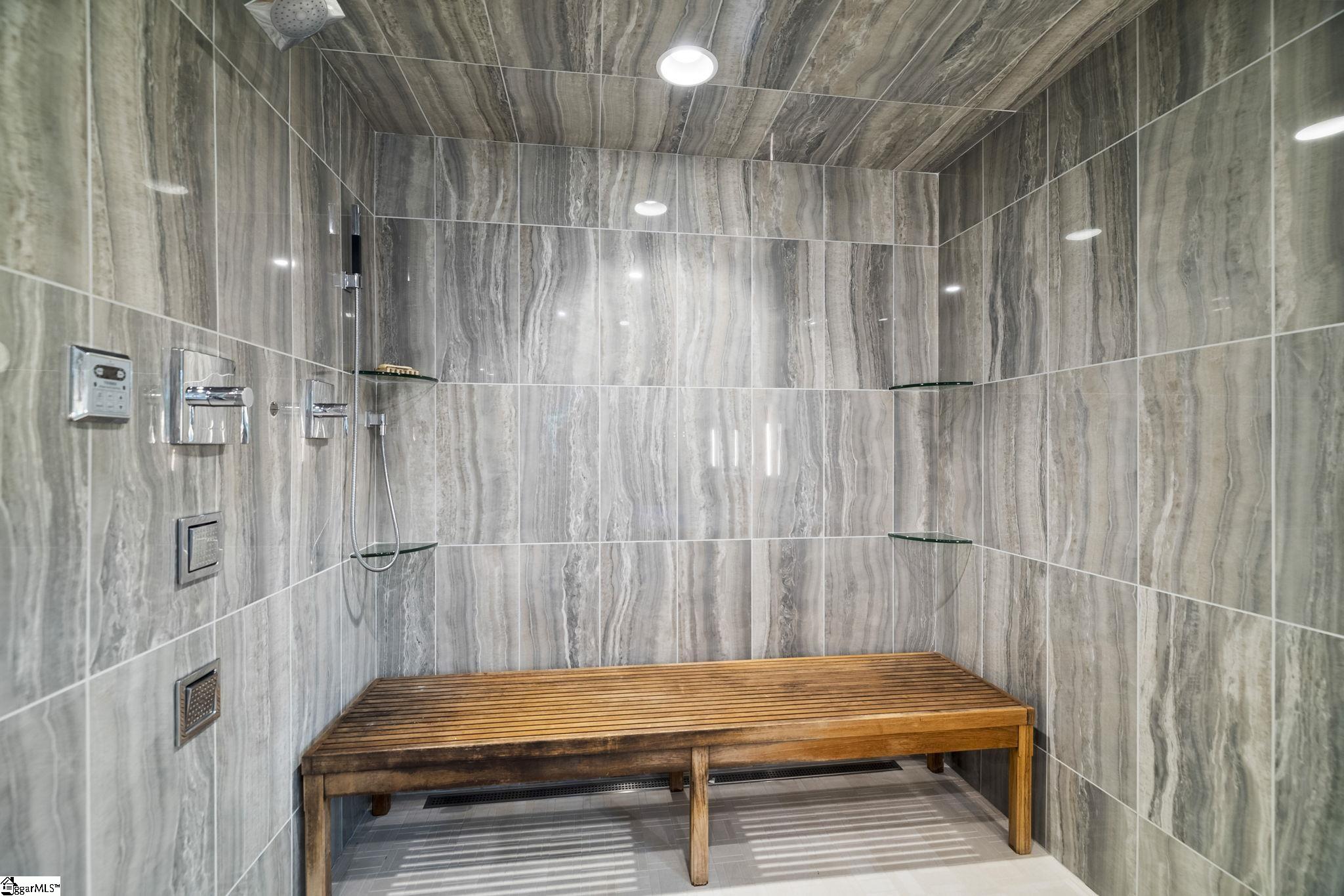 36 Gossamer Place Greenville, SC 29607 - Photo 25 of 50 Body sprayers, frameless glass, app operated sound system, custom teak bench, fully tiled, linear drain,