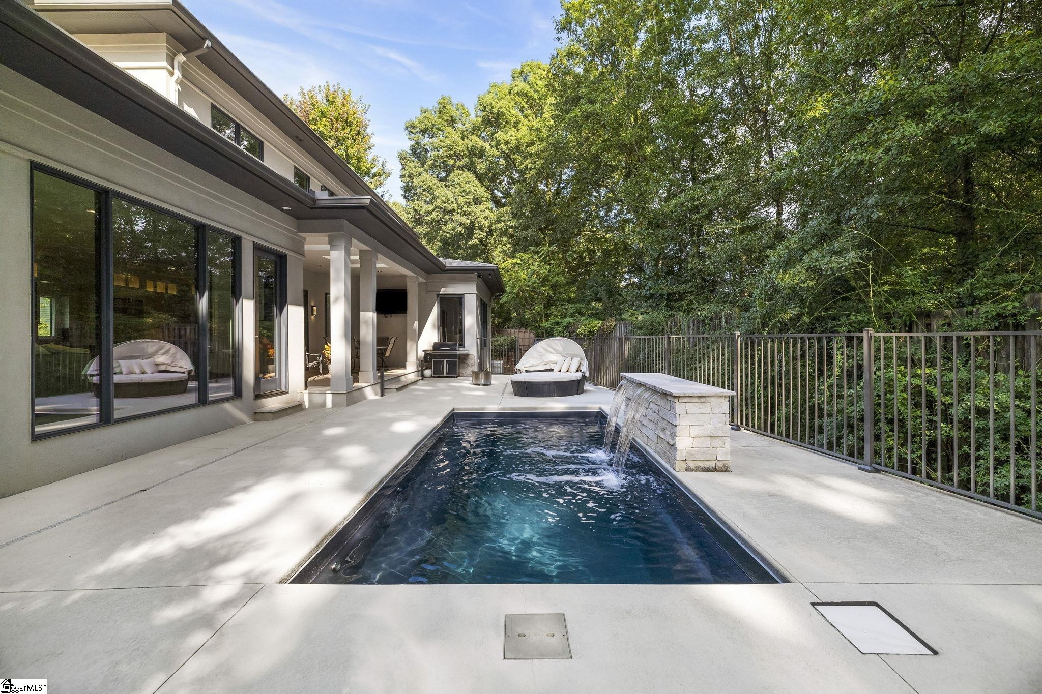 36 Gossamer Place Greenville, SC 29607 - Photo 47 of 50 Integrated seating, oversized natural gas heated, controlled by cell phone or iPad with various lighting, waterfall and remote