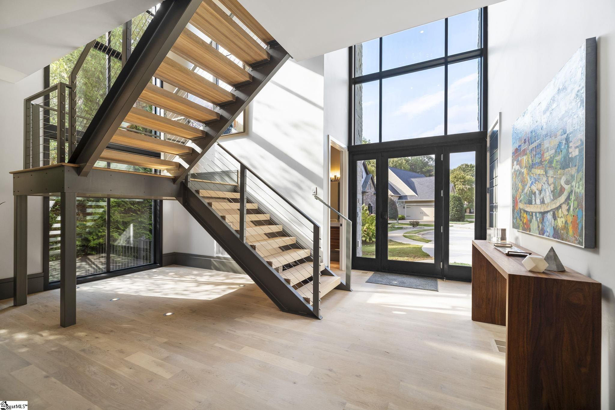 36 Gossamer Place Greenville, SC 29607 - Photo 7 of 50 Solid oak slab treads and stainless cabling