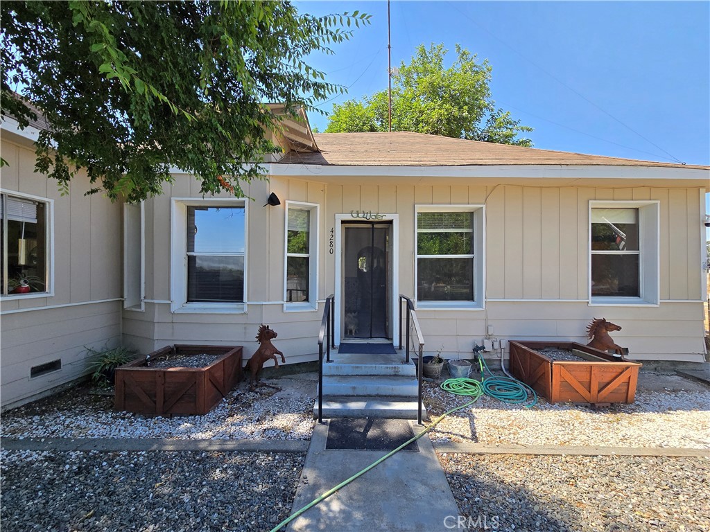 4280 County Road North Orland, CA 95963 - Photo 2 of 62 a view of a house with backyard and sitting area