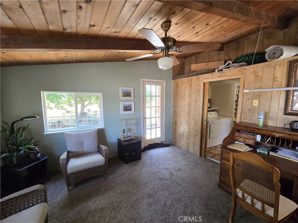 4280 County Road North Orland, CA 95963 - Photo 8 of 62 a living room with furniture a ceiling fan and a window