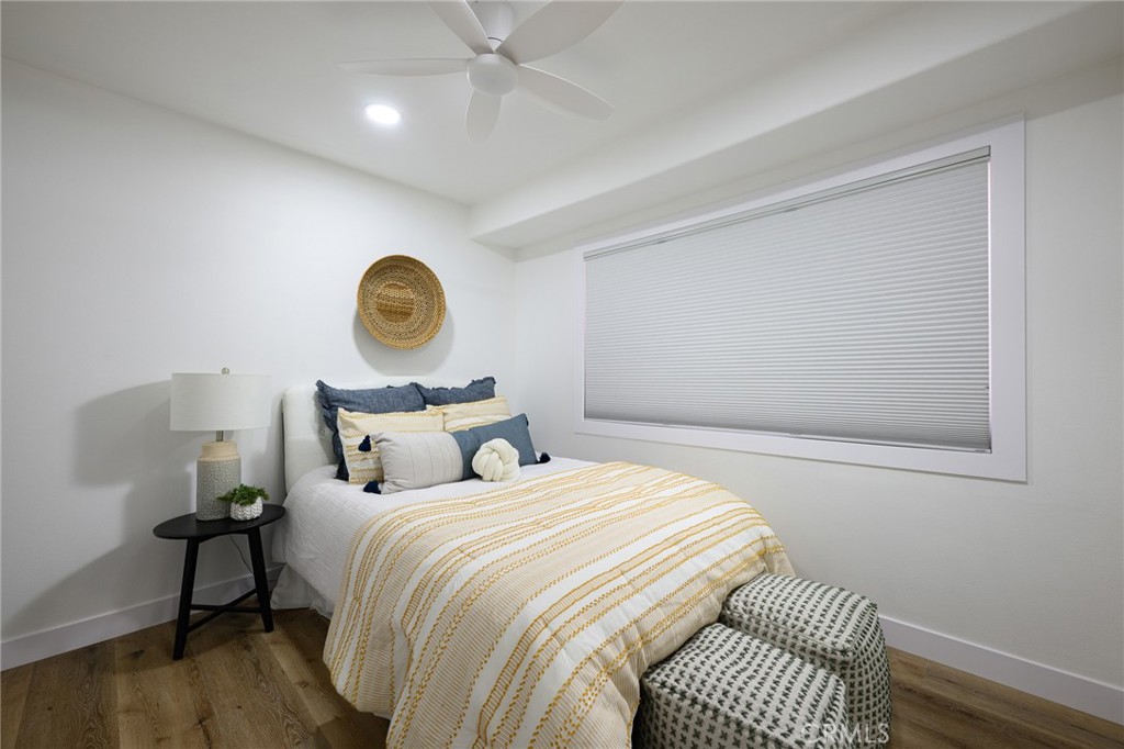 4705 East Washington Avenue Orange, CA 92869 - Photo 12 of 41 a bedroom with bed and a window