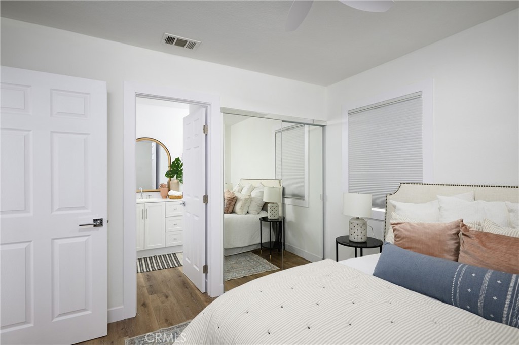 4705 East Washington Avenue Orange, CA 92869 - Photo 16 of 41 a living room with furniture and a wooden floor