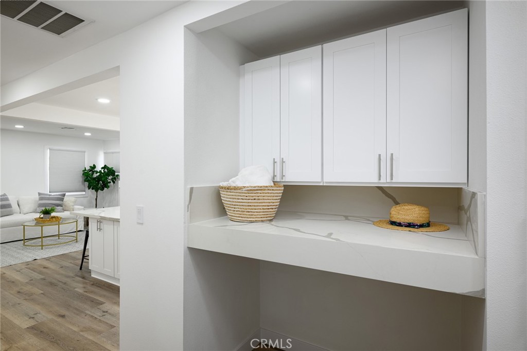 4705 East Washington Avenue Orange, CA 92869 - Photo 19 of 41 a kitchen with a sink and cabinets