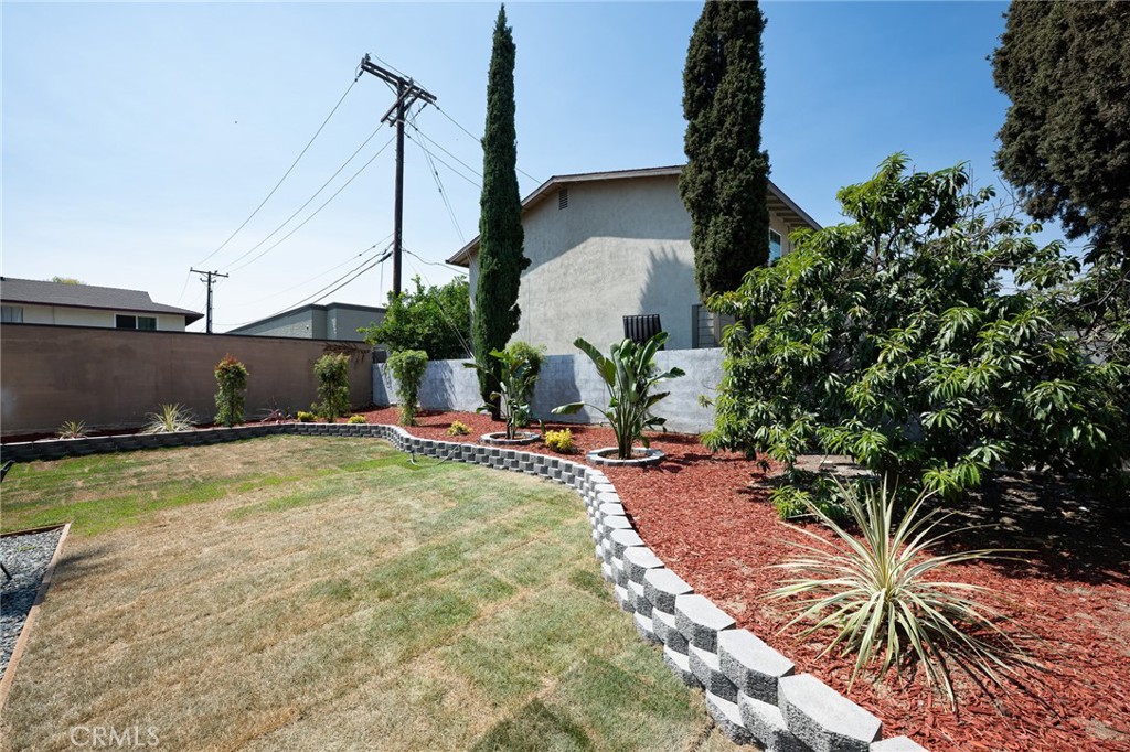4705 East Washington Avenue Orange, CA 92869 - Photo 25 of 41 a view of a yard with a slide