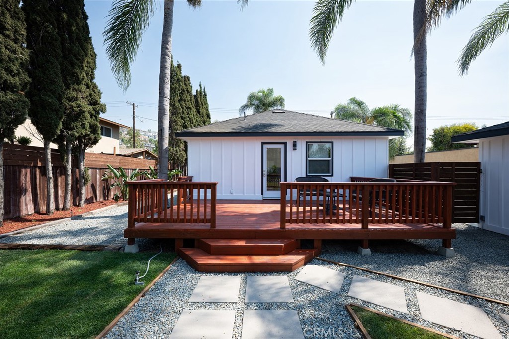 4705 East Washington Avenue Orange, CA 92869 - Photo 32 of 41 a view of a wooden deck with furniture
