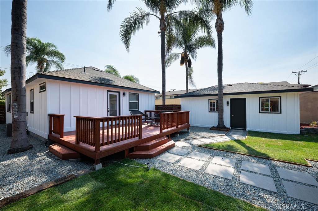 4705 East Washington Avenue Orange, CA 92869 - Photo 33 of 41 a view of a house with backyard and sitting area