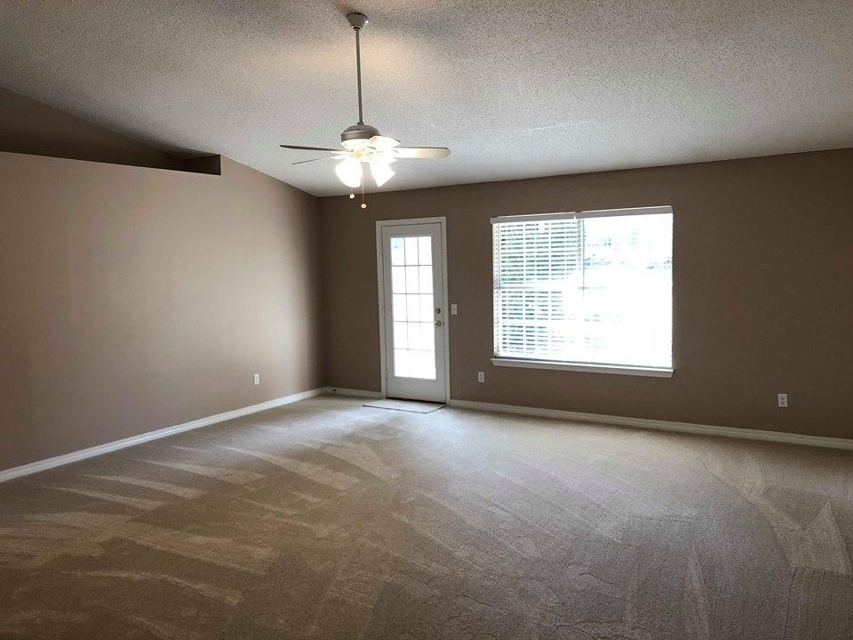 5196 Whitehurst Lane Crestview, FL 32536 - Photo 6 of 13 a view of an empty room with a window