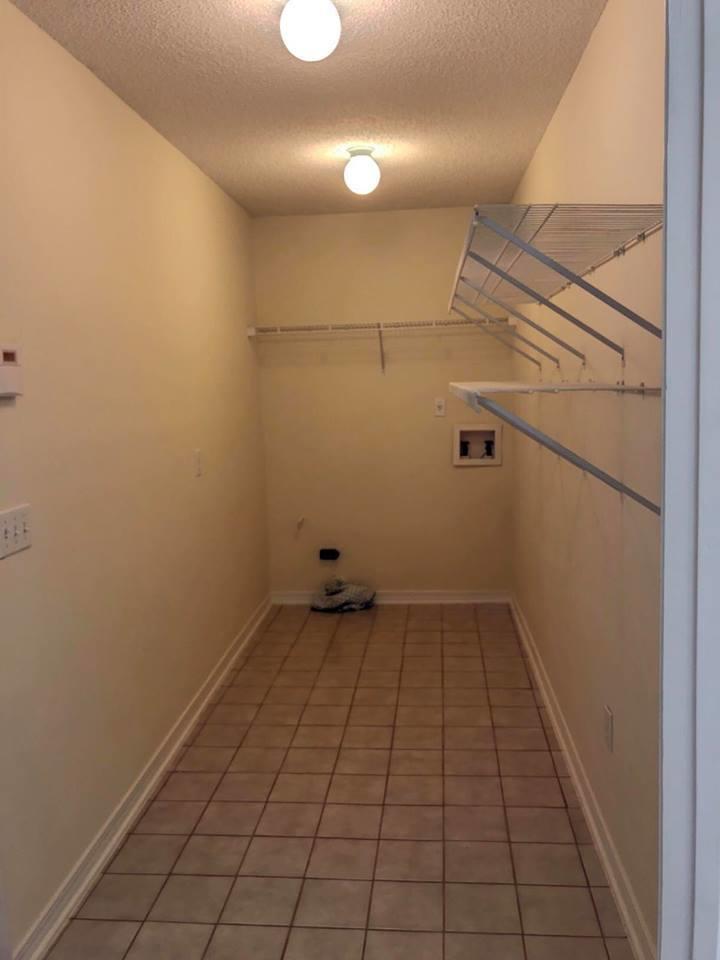 5196 Whitehurst Lane Crestview, FL 32536 - Photo 8 of 13 a view of a room with an empty space and a window