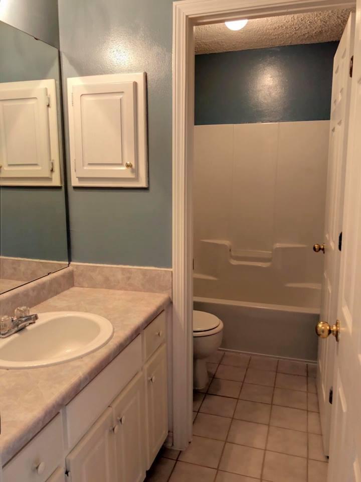 5196 Whitehurst Lane Crestview, FL 32536 - Photo 9 of 13 a bathroom with a granite countertop sink toilet and shower