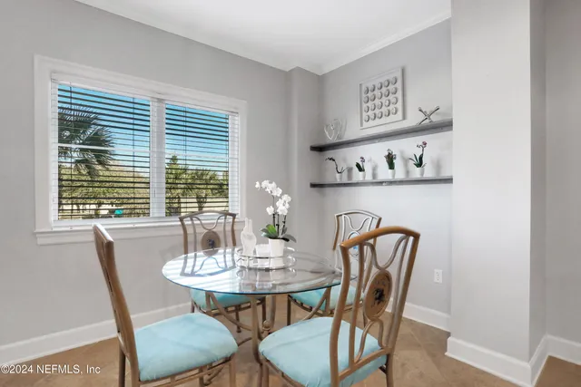 a view of a balcony with potted plants