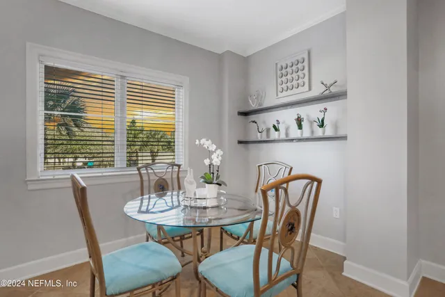 a view of balcony with two potted plants