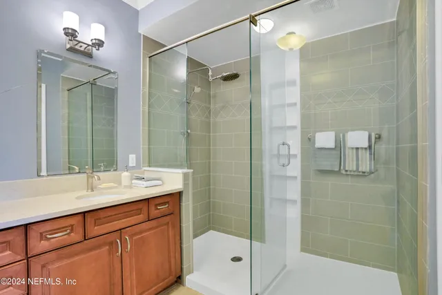 a view of a hallway with furniture and a livingroom
