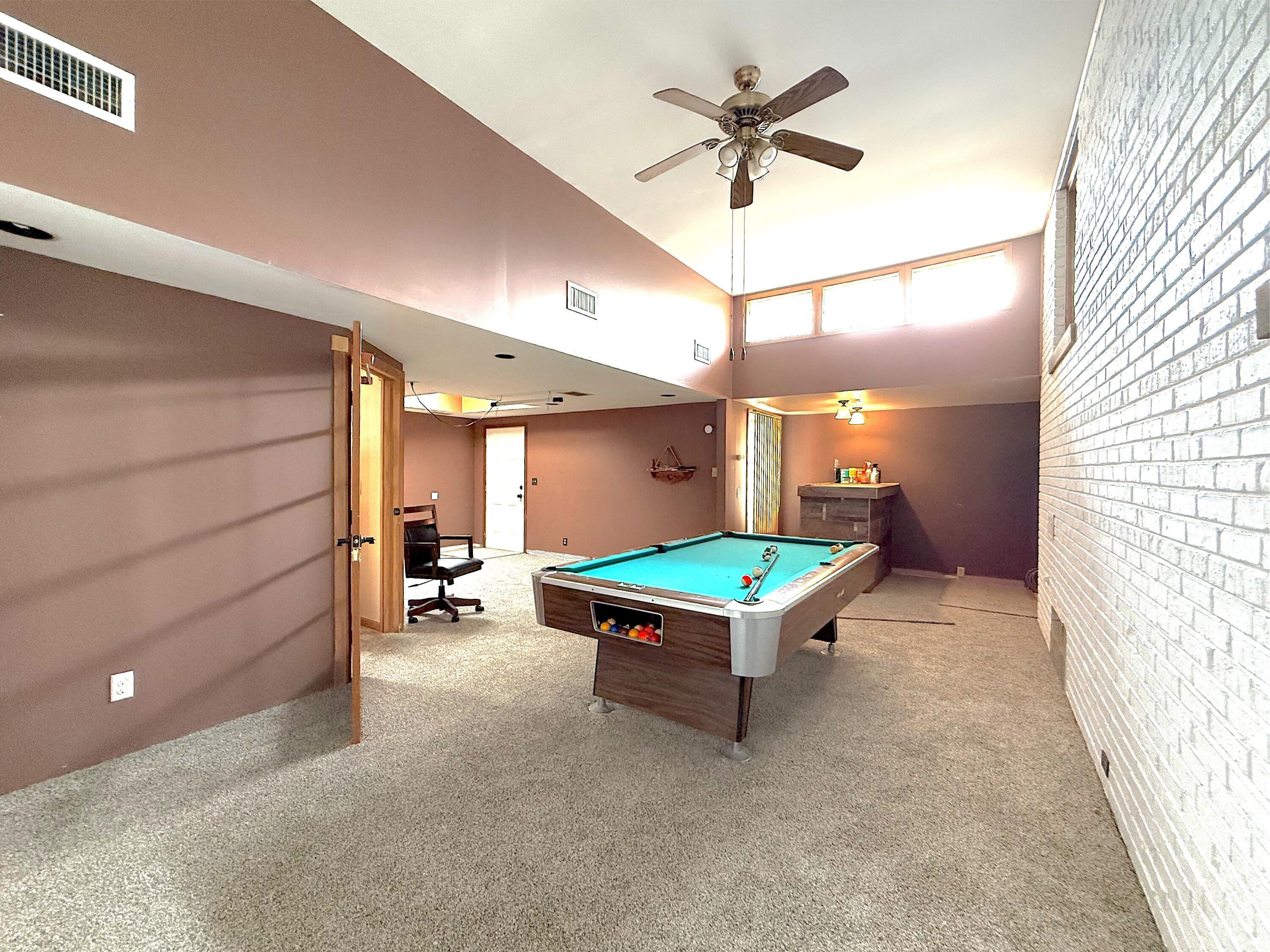4039 Torrence Avenue Hammond, IN 46327 - Photo 11 of 34 a room with pool table and a chandelier