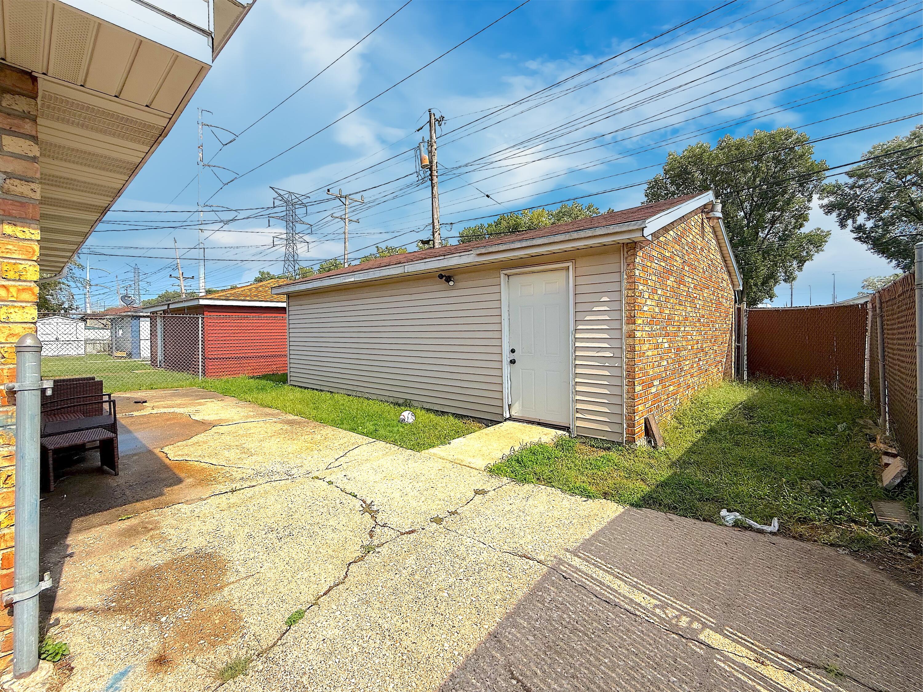 4039 Torrence Avenue Hammond, IN 46327 - Photo 15 of 34 a view of a backyard