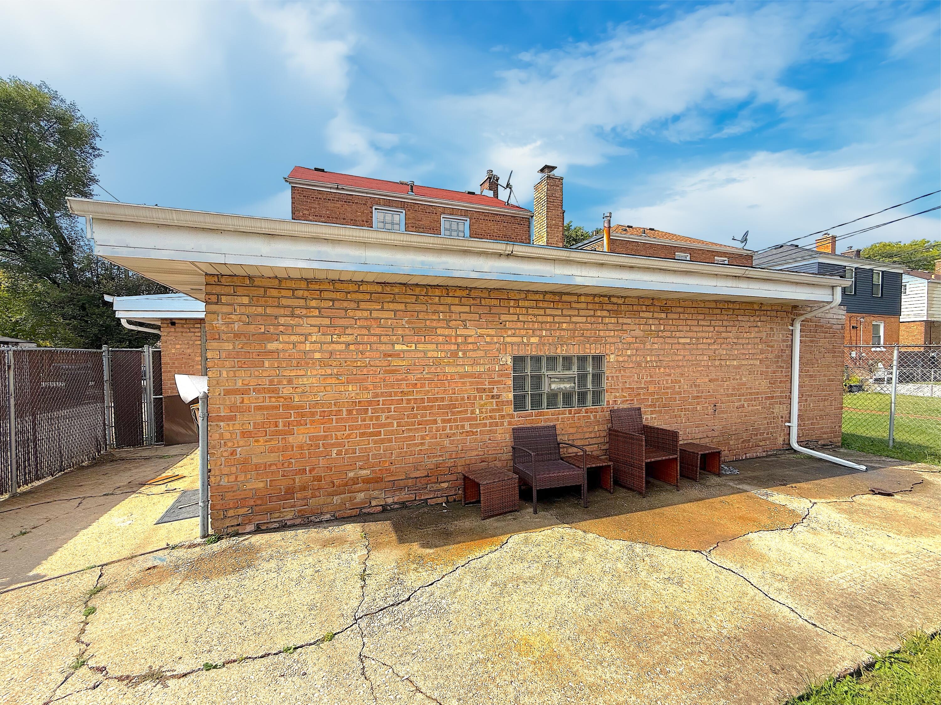 4039 Torrence Avenue Hammond, IN 46327 - Photo 17 of 34 a front view of a house with patio