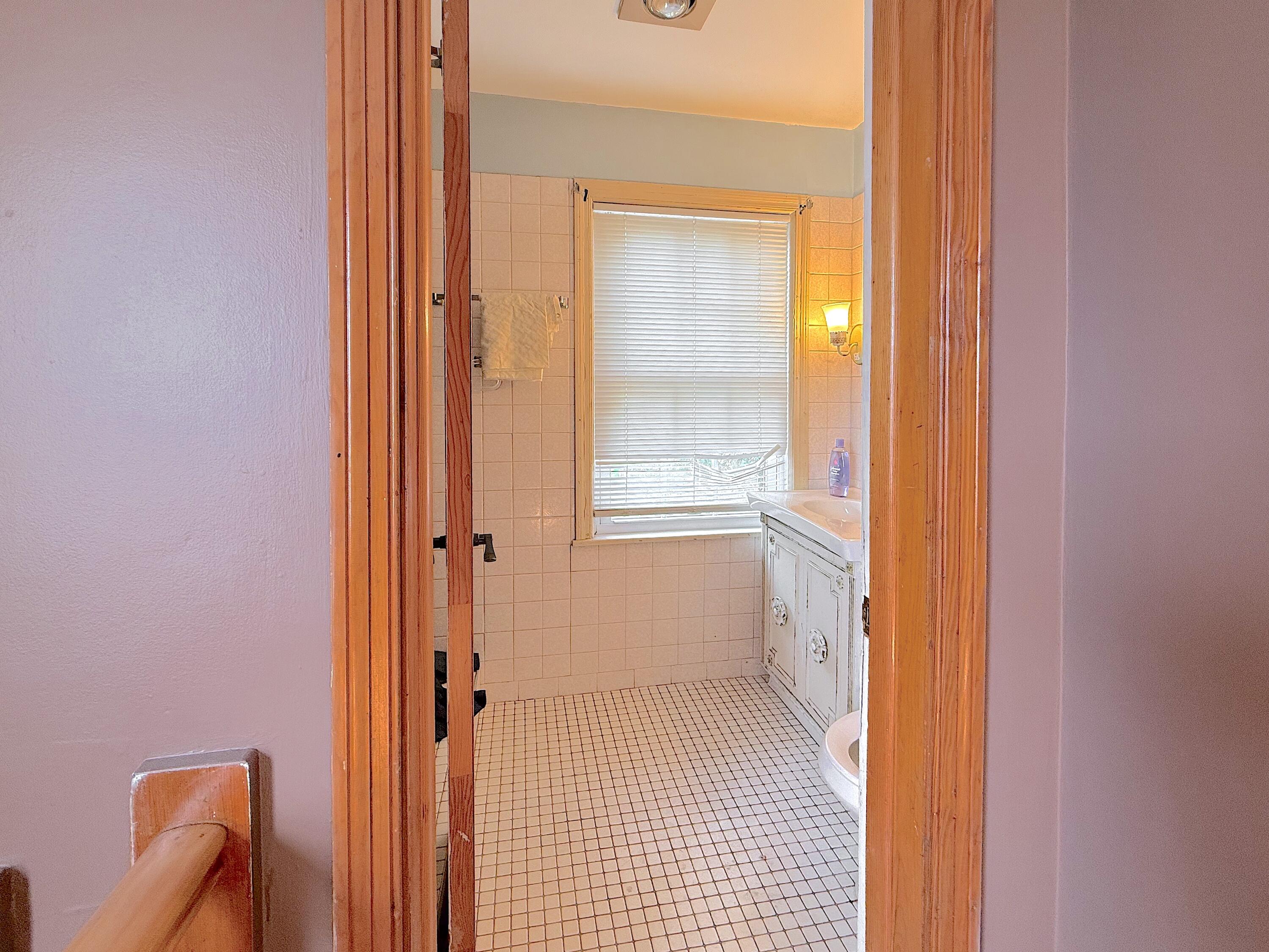 4039 Torrence Avenue Hammond, IN 46327 - Photo 26 of 34 a bathroom with a toilet and a shower