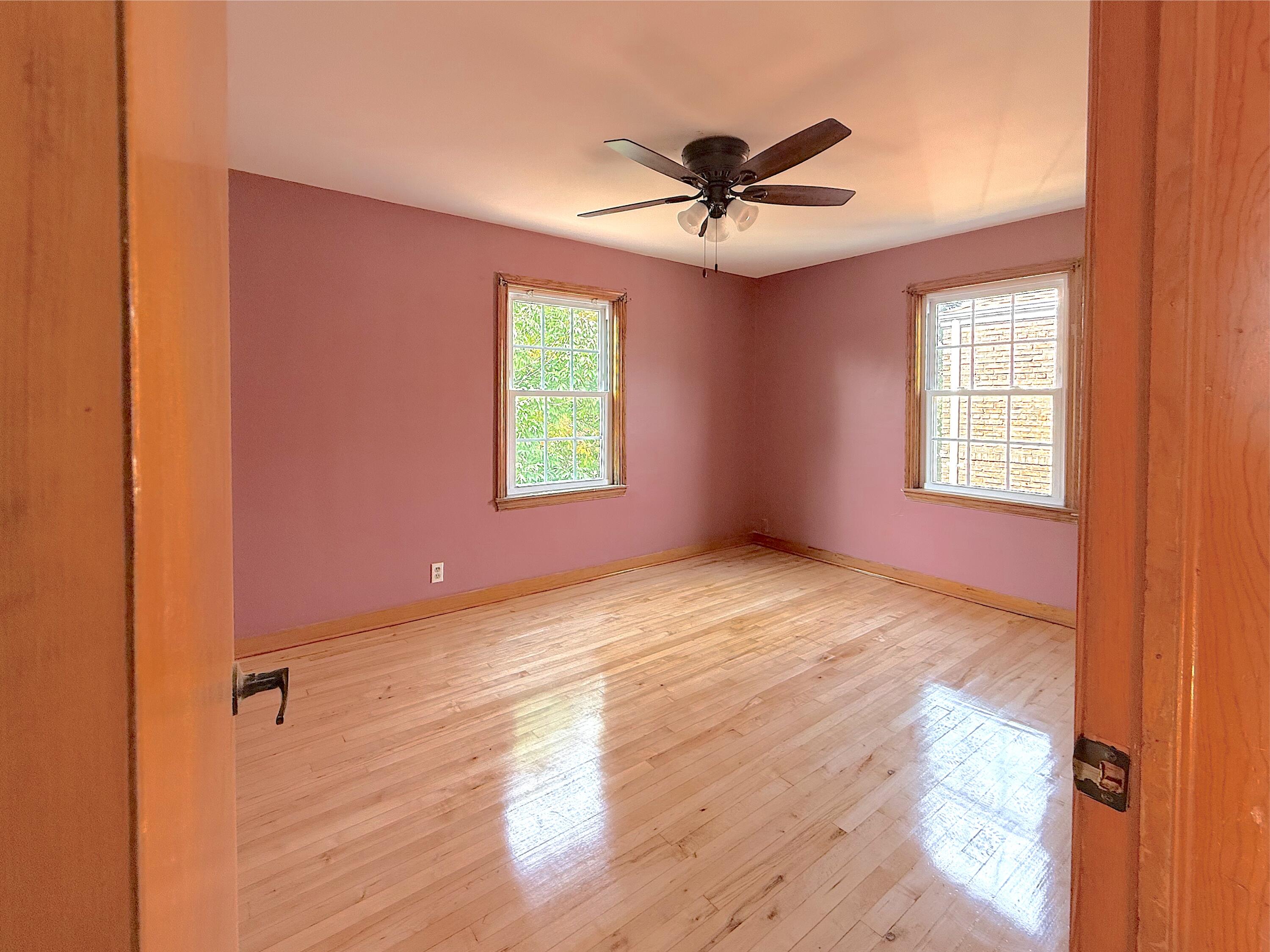 4039 Torrence Avenue Hammond, IN 46327 - Photo 29 of 34 a view of an empty room with a window and wooden floor