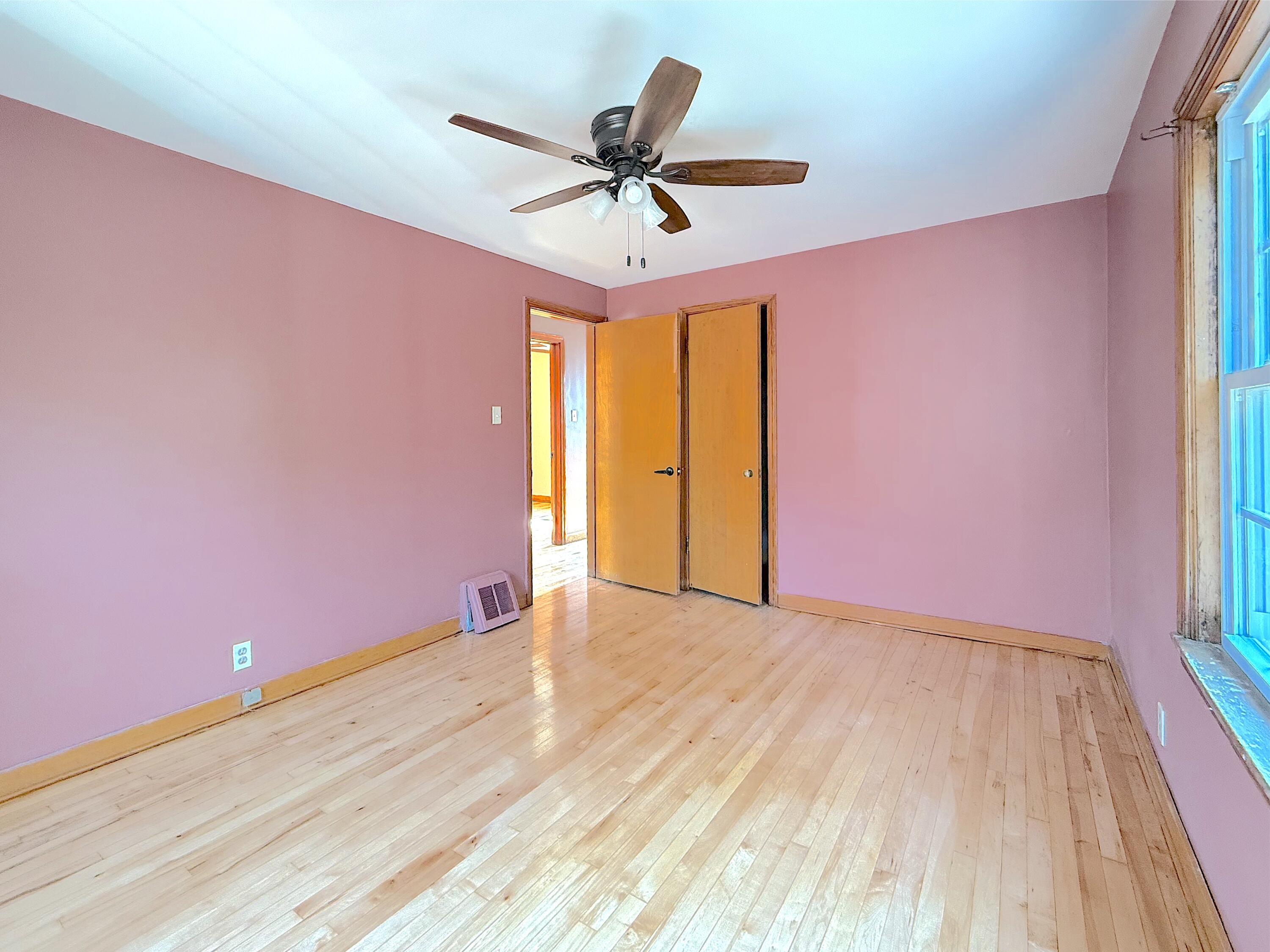 4039 Torrence Avenue Hammond, IN 46327 - Photo 30 of 34 a view of a room with a ceiling fan and window
