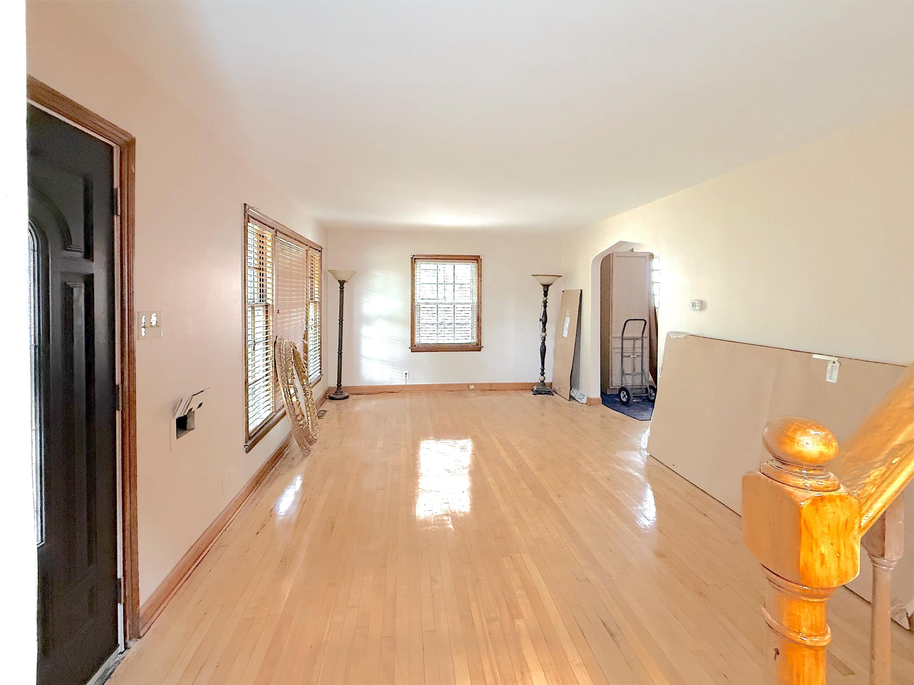 4039 Torrence Avenue Hammond, IN 46327 - Photo 3 of 34 a view of a room with wooden floor and window