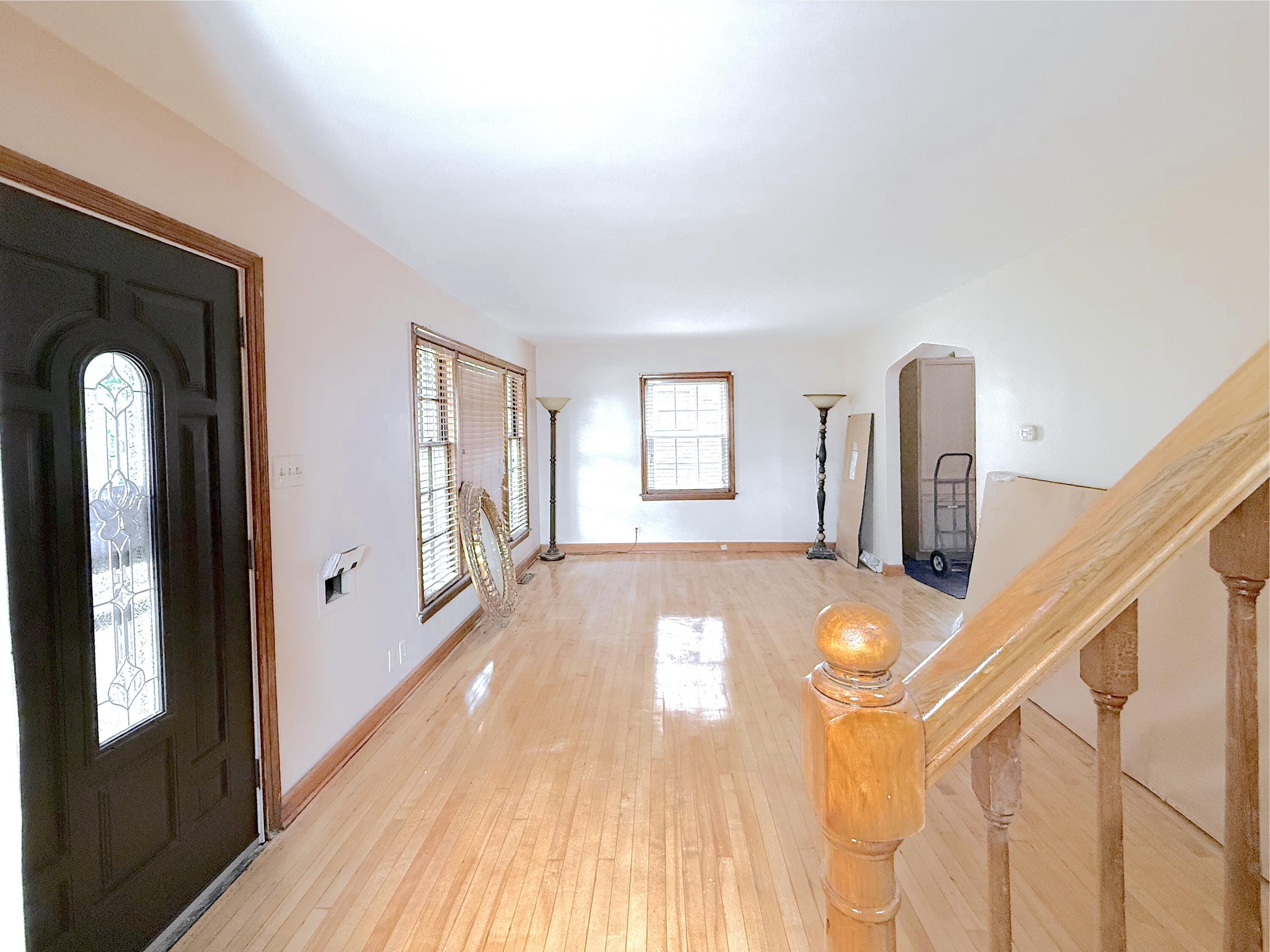 4039 Torrence Avenue Hammond, IN 46327 - Photo 4 of 34 a view of a livingroom with wooden floor and furniture