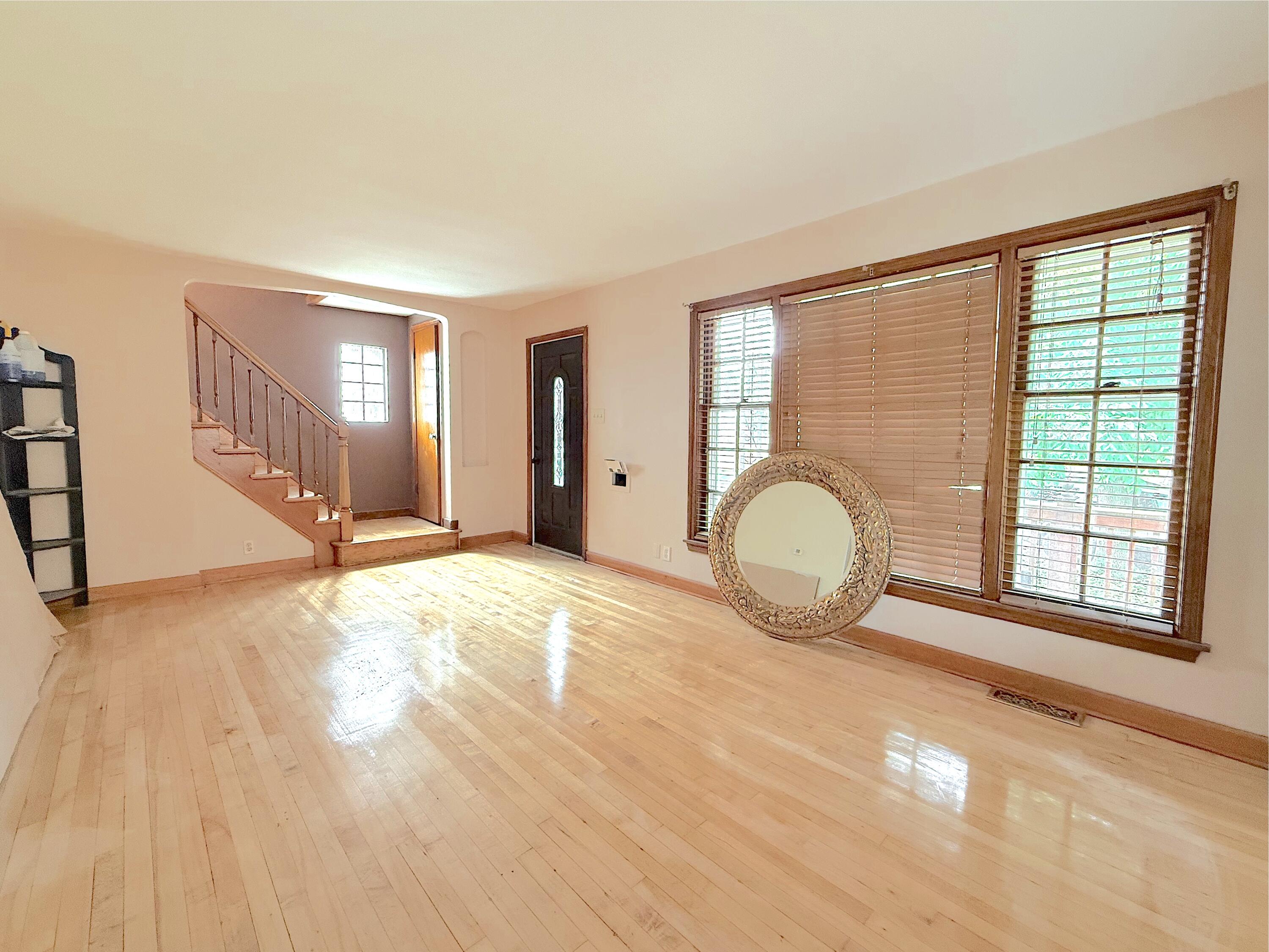 4039 Torrence Avenue Hammond, IN 46327 - Photo 5 of 34 a view of a livingroom with furniture wooden floor and window