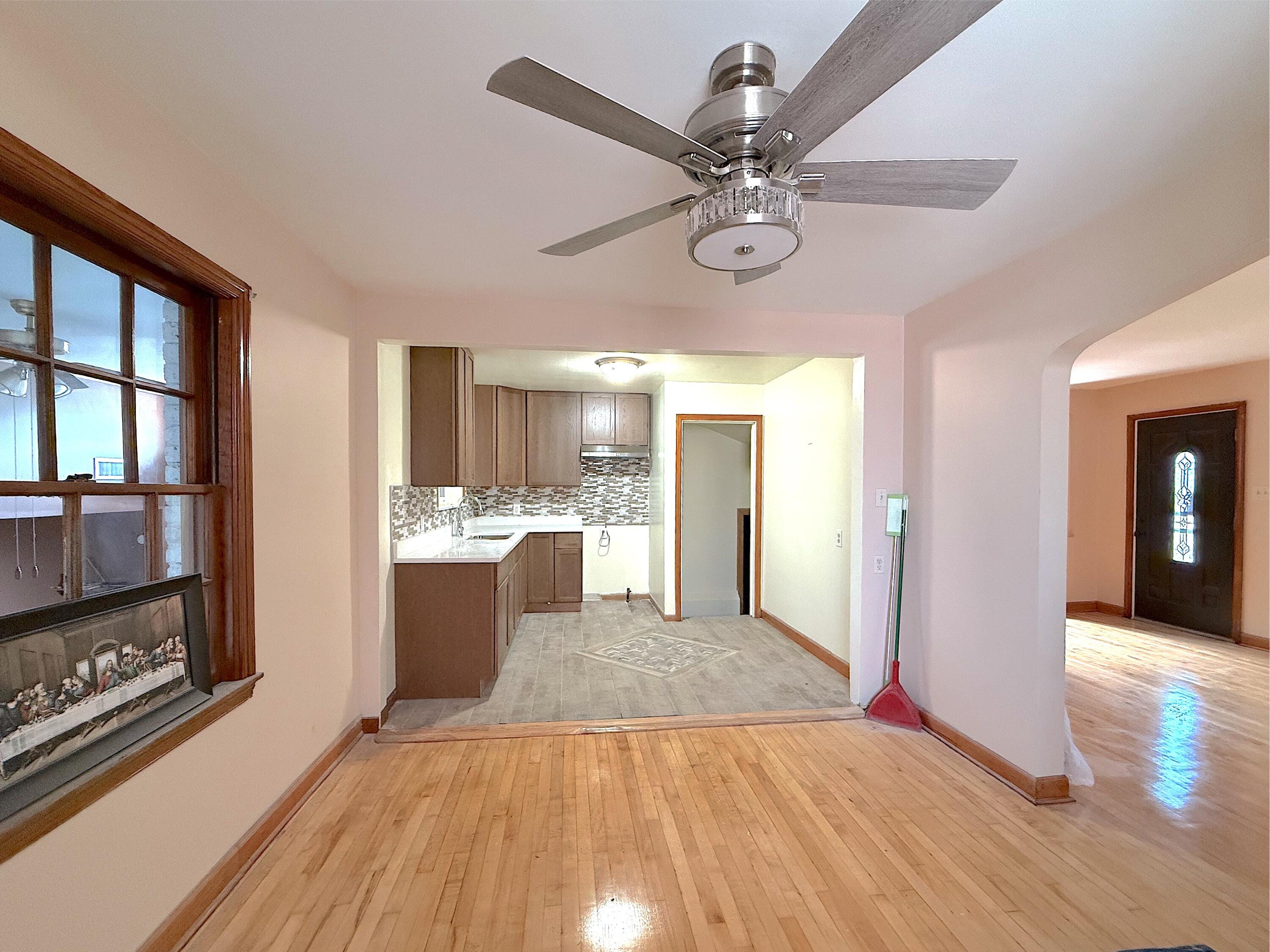 4039 Torrence Avenue Hammond, IN 46327 - Photo 7 of 34 a view of a kitchen with a sink and a window