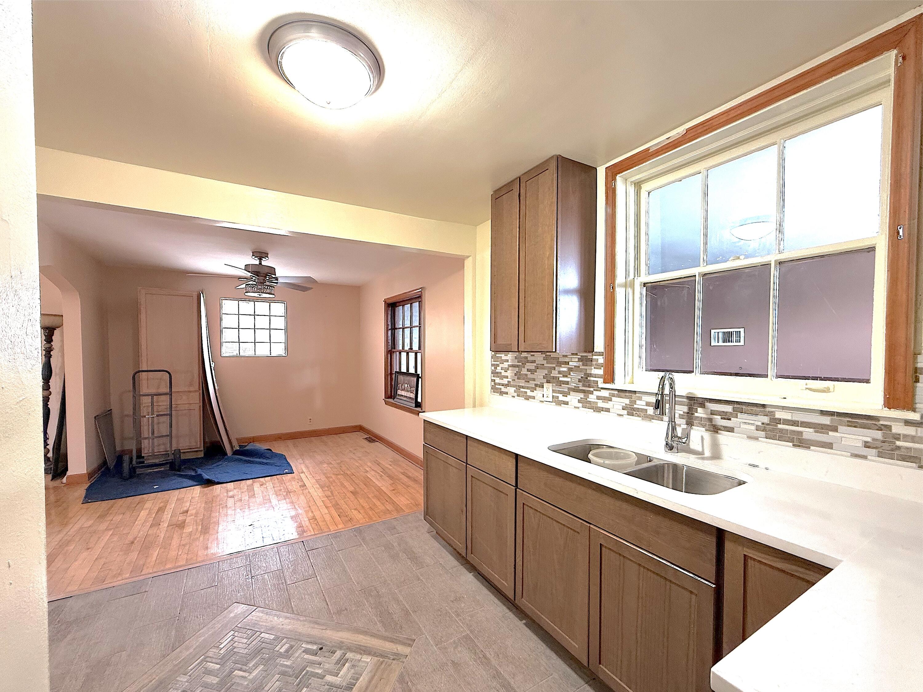 4039 Torrence Avenue Hammond, IN 46327 - Photo 8 of 34 a bathroom with a double vanity sink and a mirror