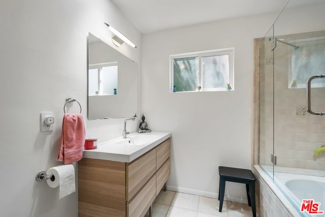 a view of swimming pool with a patio