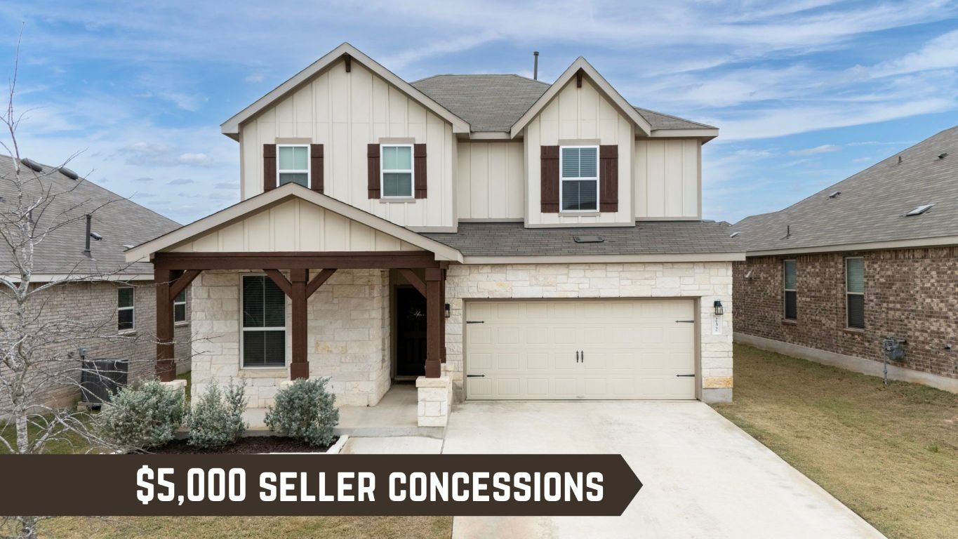 a front view of a house with a garage