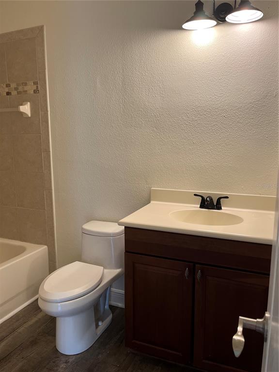 200 Riverview Bend South, Unit 921 Palm Coast, FL 32137 - Photo 18 of 27 a bathroom with a sink toilet and shower
