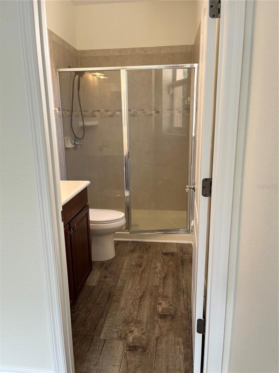 200 Riverview Bend South, Unit 921 Palm Coast, FL 32137 - Photo 24 of 27 a bathroom with a granite countertop shower and a toilet